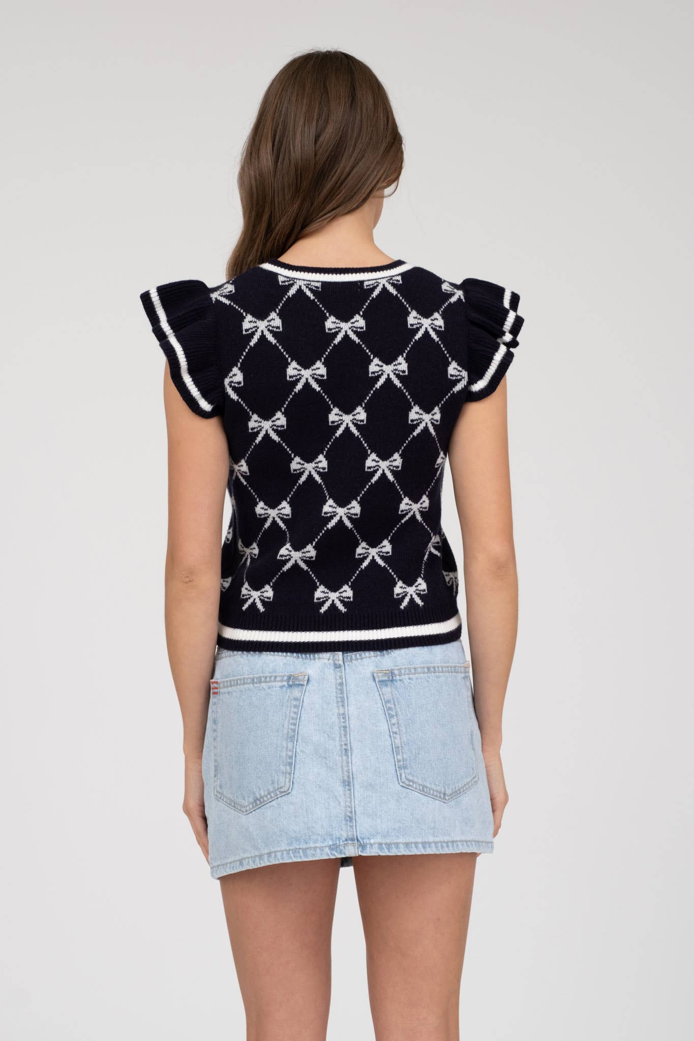 NAVY BOW RUFFLE SLEEVE TOP