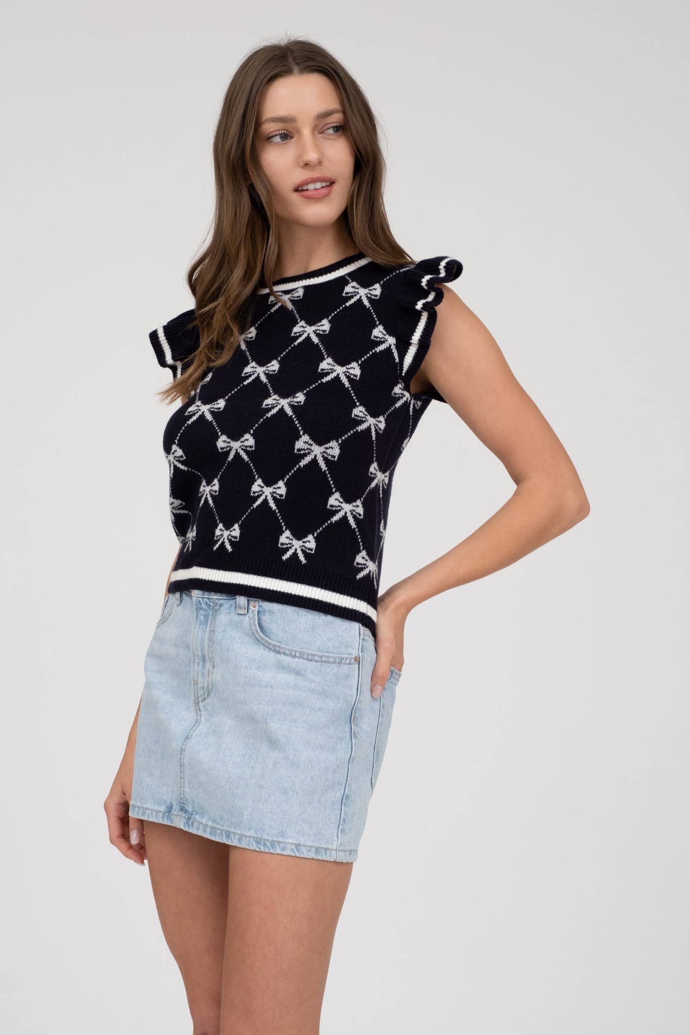 NAVY BOW RUFFLE SLEEVE TOP