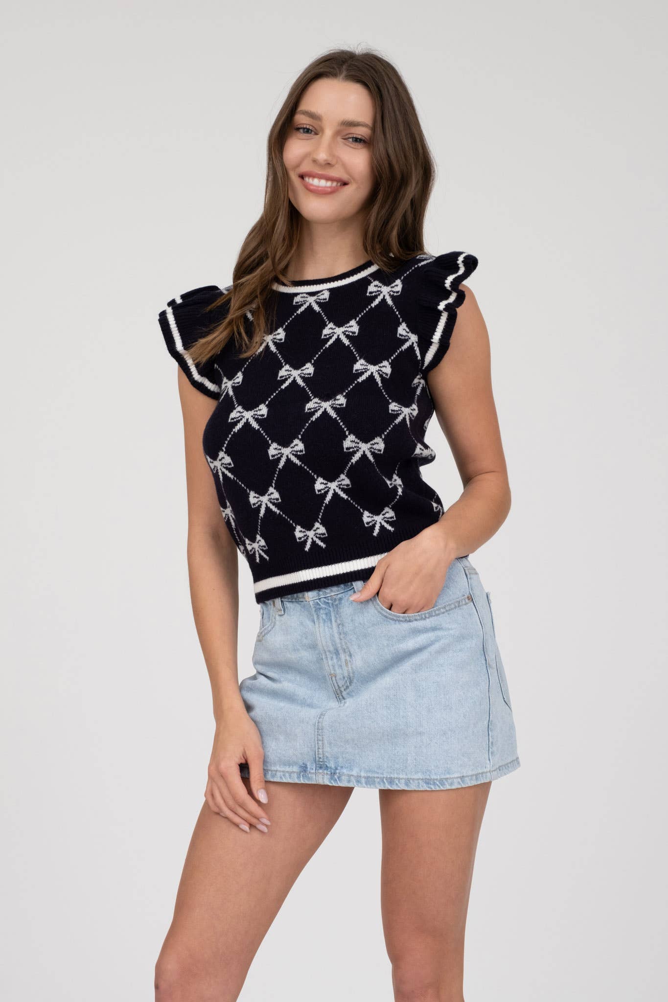 NAVY BOW RUFFLE SLEEVE TOP